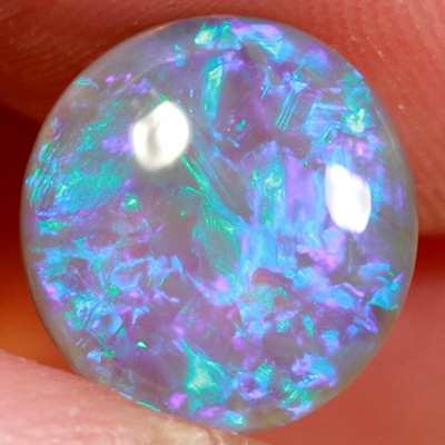 SOLID CRYSTAL OPAL Blue fire in a very 3 dimensional play of colour. Bright, clean colours. With VIDEO